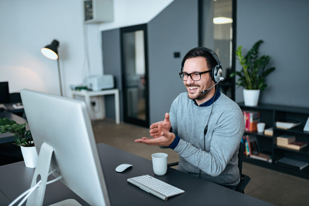 Illustration of a telemedicine doctor in a white coat reviewing tax documents while on a video call with a patient, with a tax calendar in the background