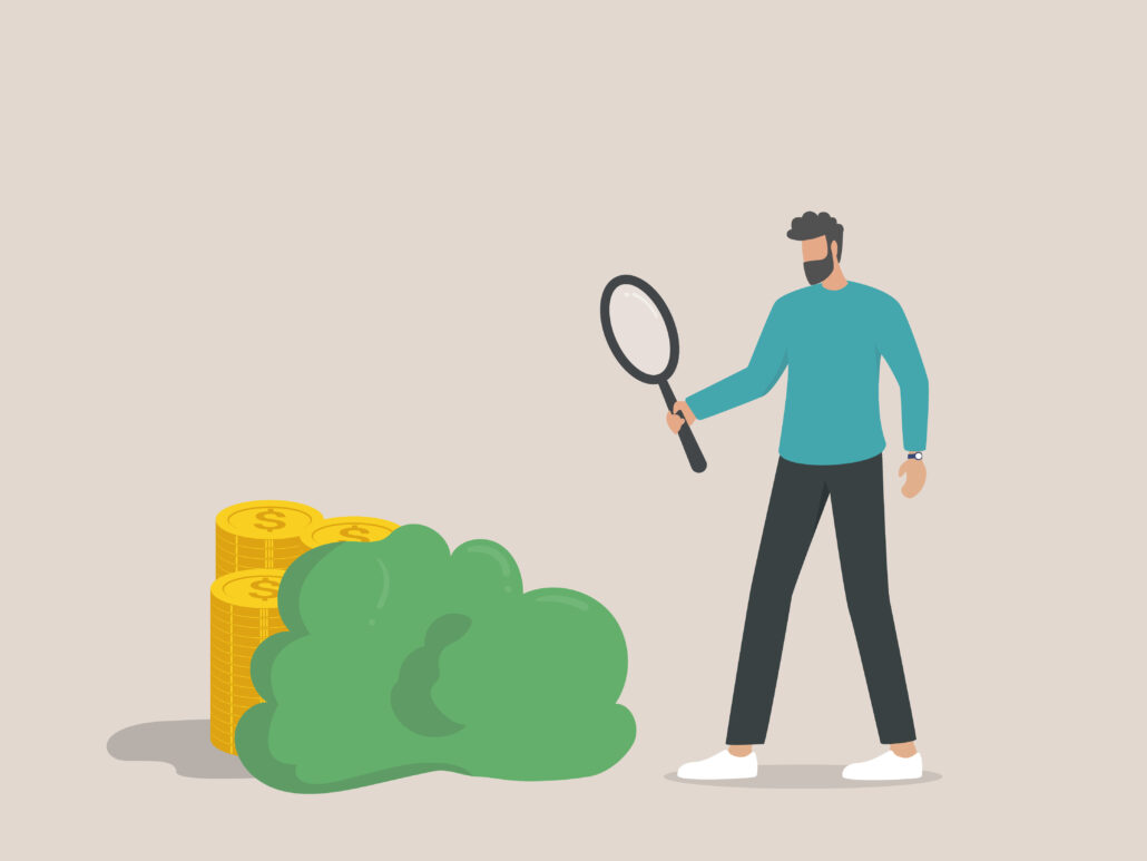 Illustration of a man holding a magnifying glass, inspecting a bush hiding gold coins, symbolizing discovering hidden financial threats or risks.