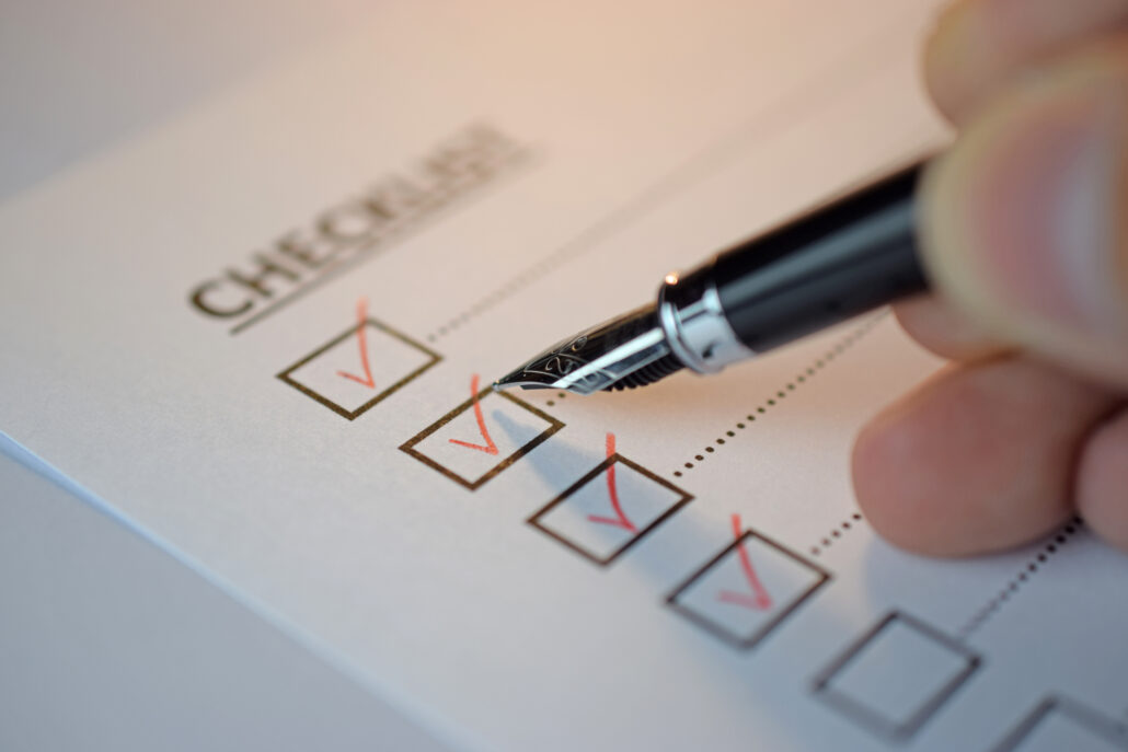 Physician reviewing a year-end tax planning checklist before 2026.